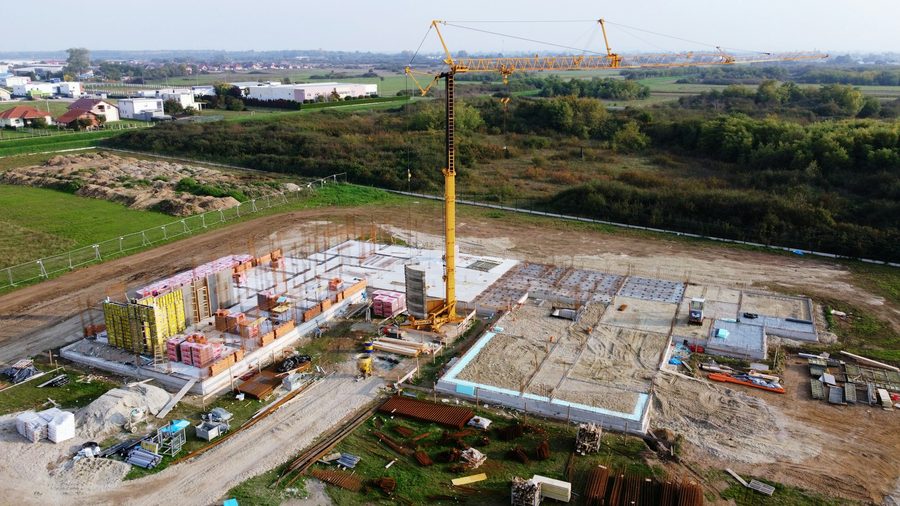 Aerial view of a large-scale construction site with buildings under construction